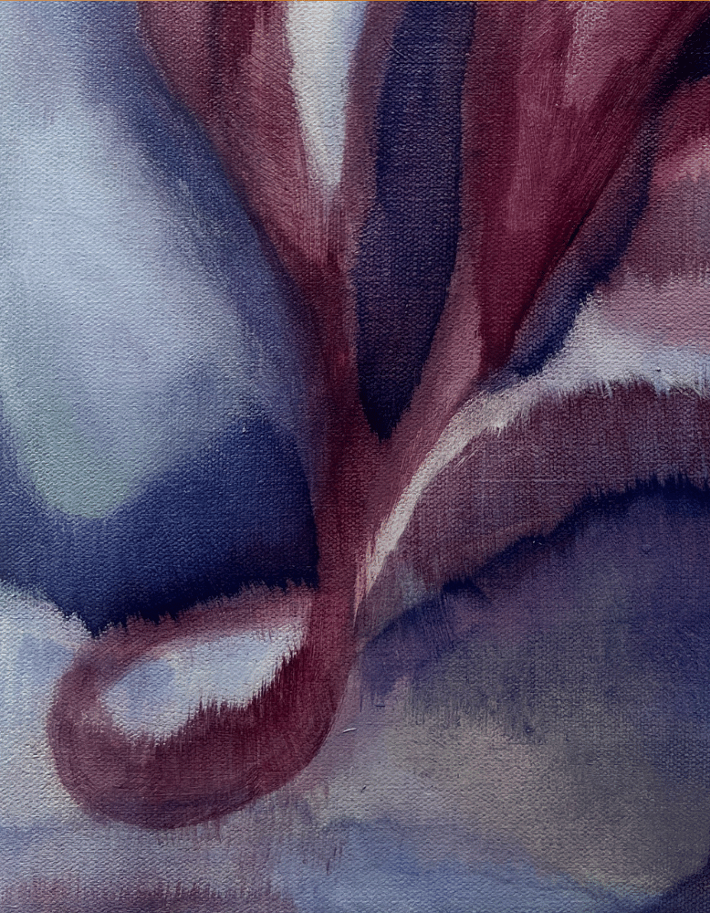 Close-up of a fabric with a floral pattern in shades of purple and pink.